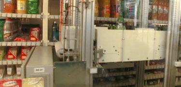 Sistema de expendición para grandes tiendas automáticas a través de un robot-grúa