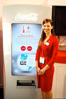 coca-cola vending donación cruz roja