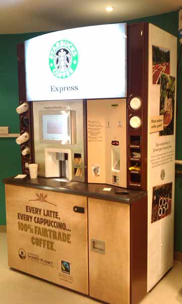 Fundir étnico Duquesa Starbucks complementa sus servicios con máquinas expendedoras de café -  HostelVending